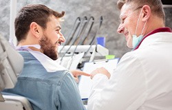 Orange Park patient at dental checkup for implant maintenance
