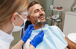 Man in dental chair about to have examination